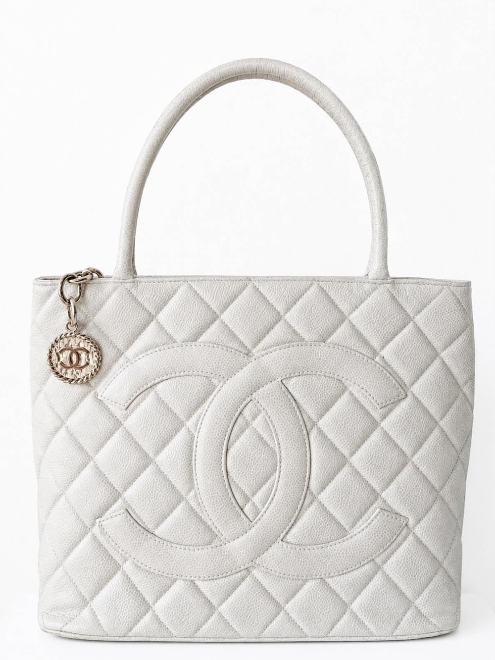 CHANEL Cream Quilted Tote with CC Medallion